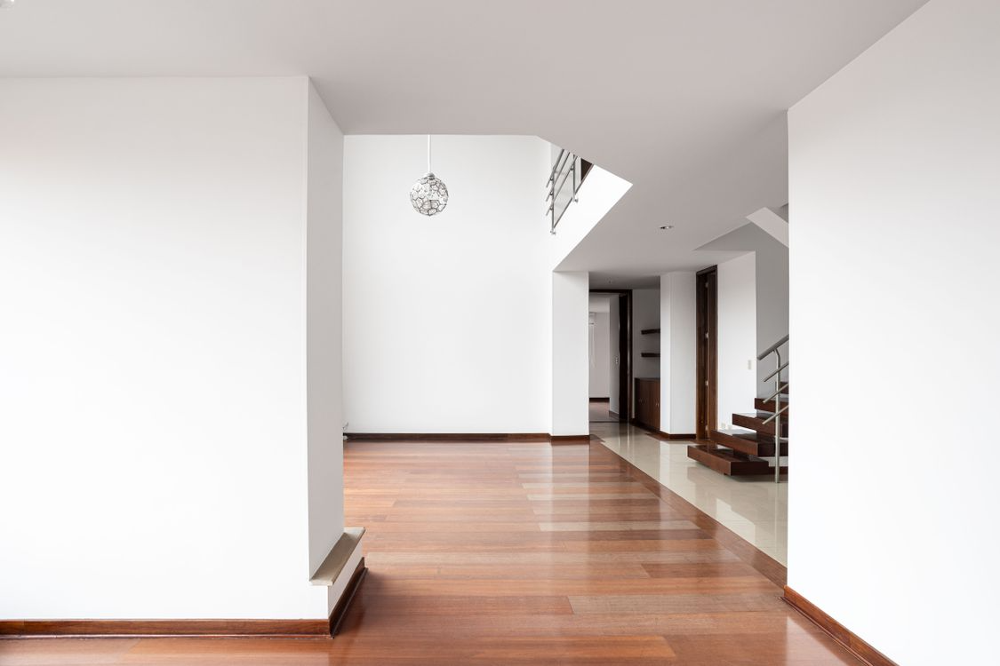 Bright hardwood interior of a managed rental property